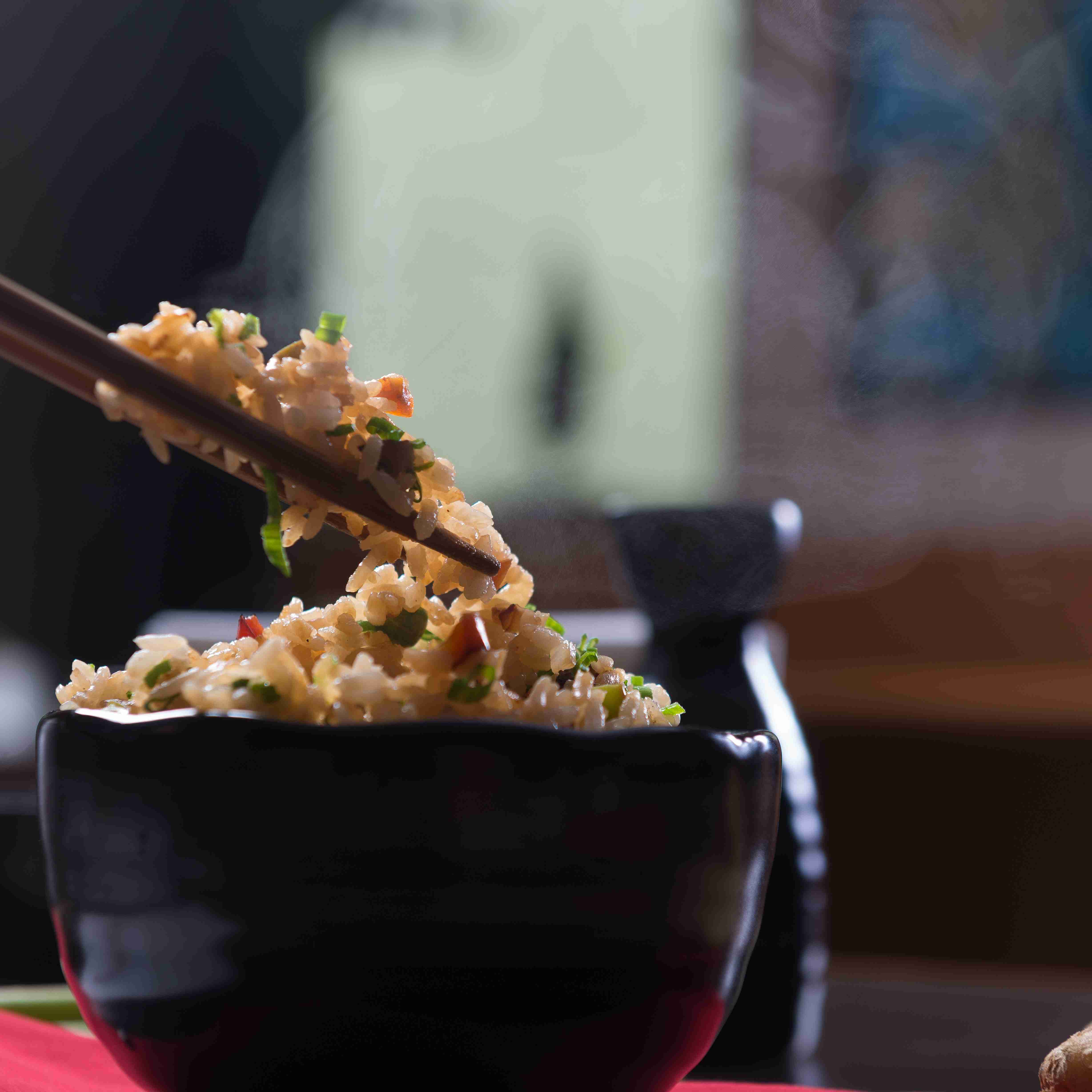 Delicious food with chopsticks
